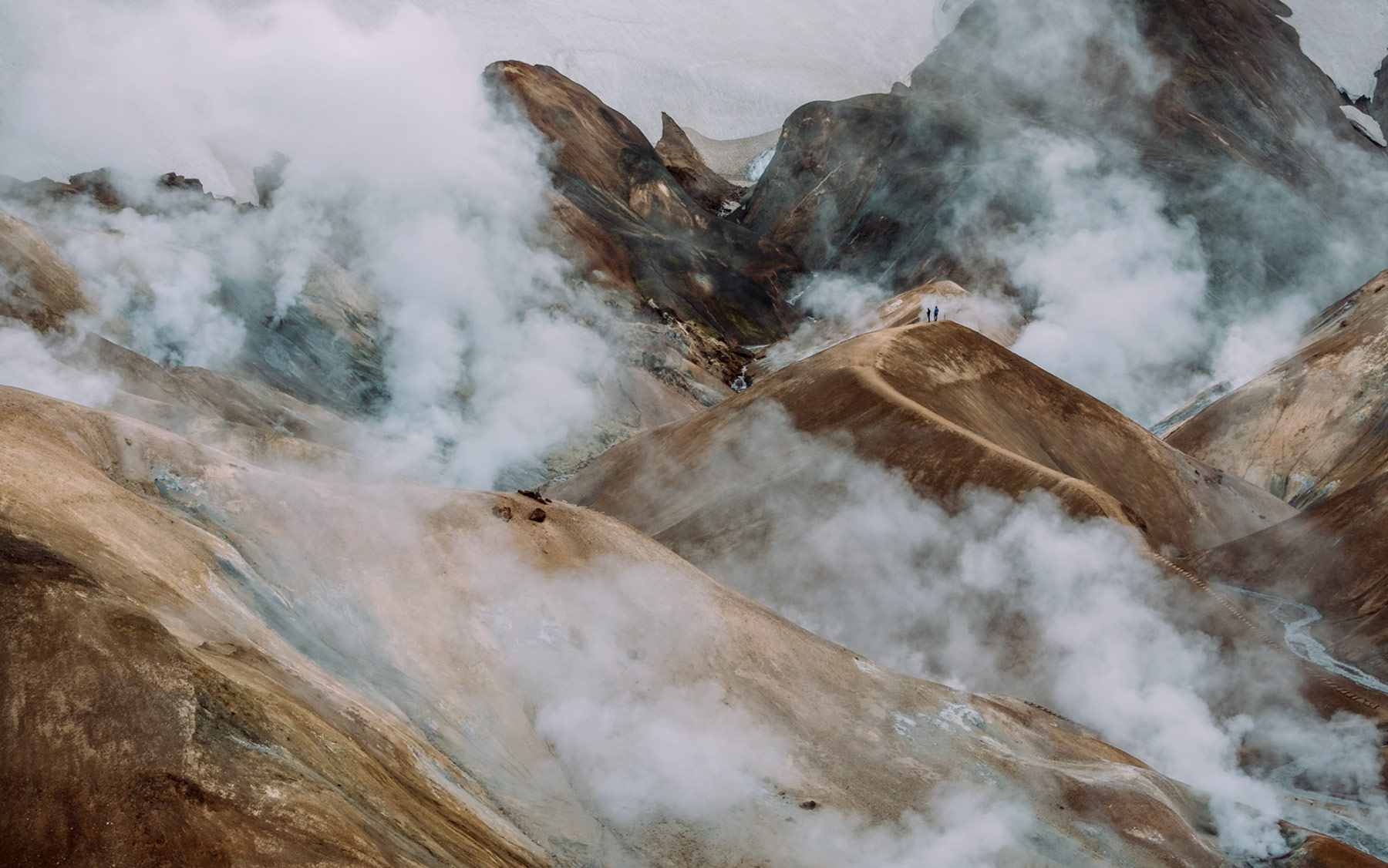 After: A custom preset with previous editing settings was applied. The fog on the mountain image is crisper with more detail. After: A custom preset with previous editing settings was applied. The fog on the mountain image is crisper with more detail.
