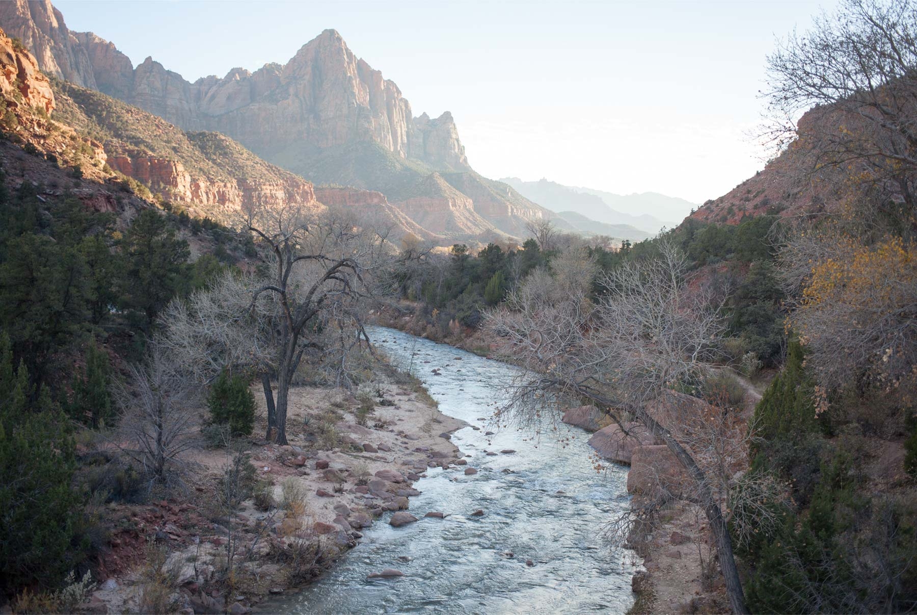 Original canyon and river image appears dull with muted colors. Original canyon and river image appears dull with muted colors.