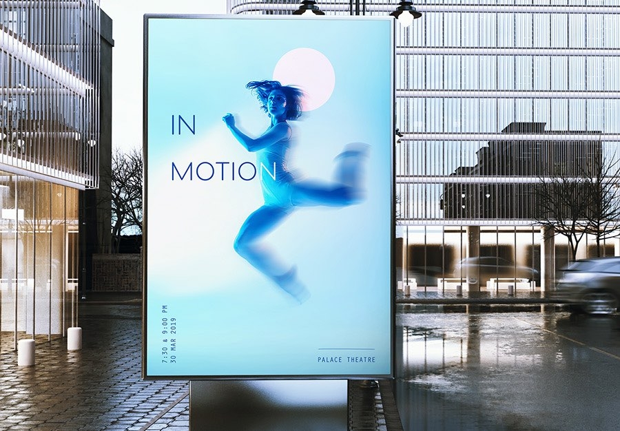 Image with Path Blur set in poster placeholder in front of two city buildings Image with Path Blur set in poster placeholder in front of two city buildings