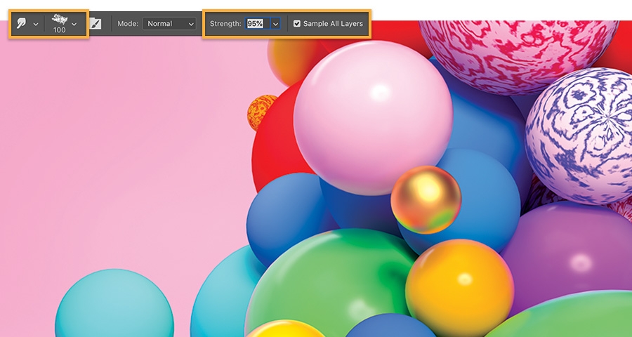 Smudge tool settings displayed in Options bar at the top of the colorful image with the spheres Smudge tool settings displayed in Options bar at the top of the colorful image with the spheres