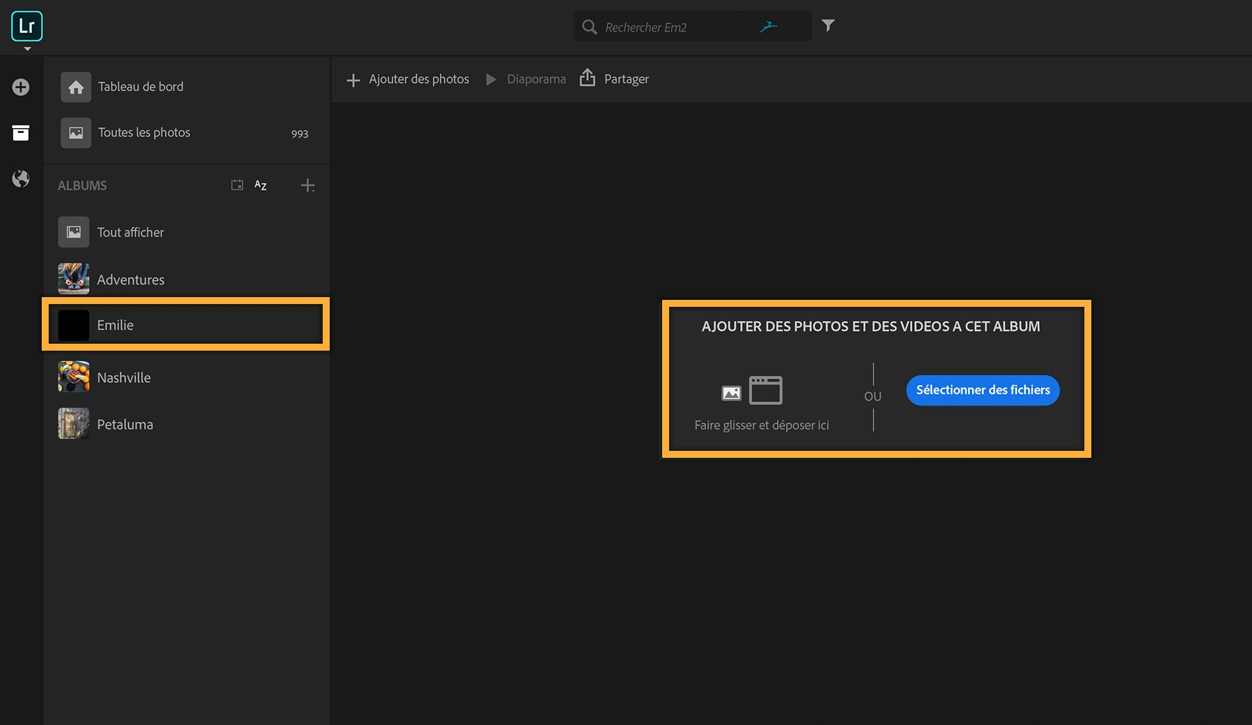 Ajoutez des photos stockées sur votre ordinateur par simple glisser-déposer, ou sélectionnez des fichiers pour ajouter des photos dans l’album.