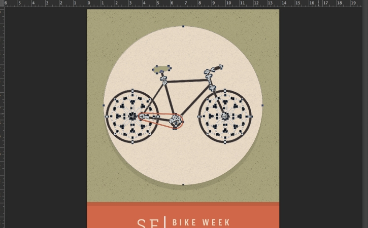 Des formes placées sur différents calques du vélo sont sélectionnées et alignées sur le centre de la zone de travail.