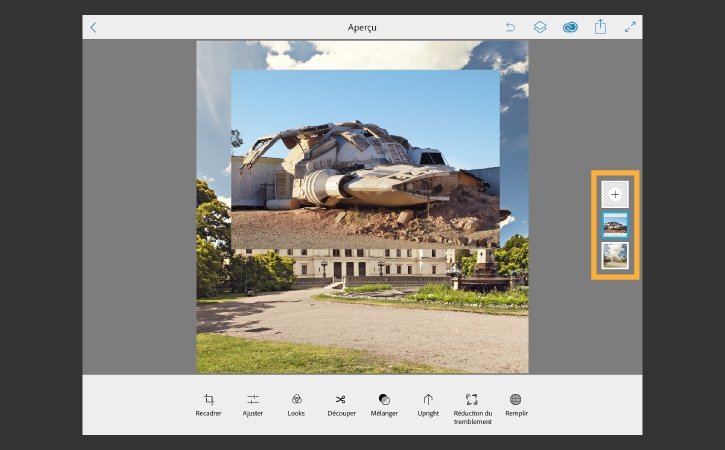 La photo d’un vaisseau spatial est placée sur le bâtiment du campus et apparaît dans un nouveau calque.