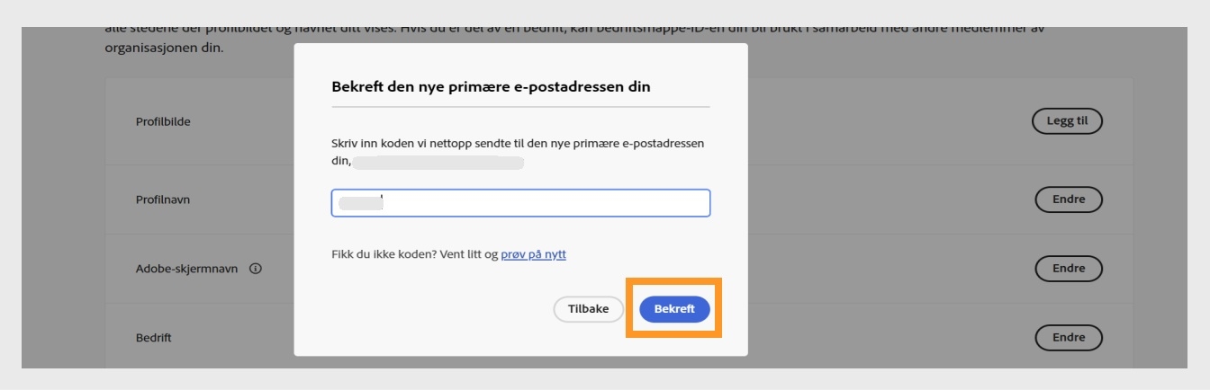 Dialogboksen Bekreft e-posten din med et felt for å skrive inn bekreftelseskoden og den uthevede Bekreft-knappen.